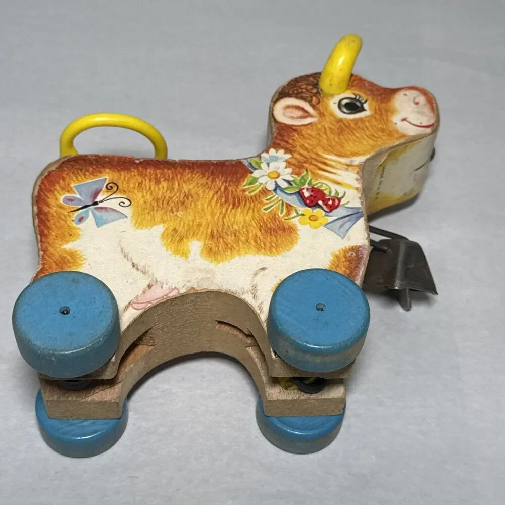 Fisher Price Vintage 1960s Bossy Bell Wooden Cow Pull Toy Tail Spins Cow Bell